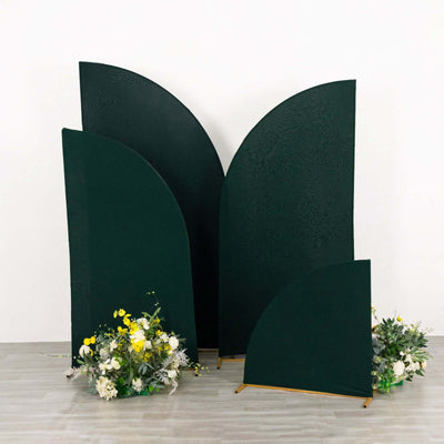Decorative green backdrop panels with floral arrangements
