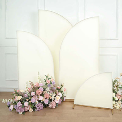 Curved backdrop panels with pastel flowers in a studio setting.