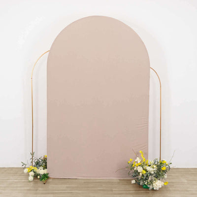Neutral arch backdrop with floral arrangements for events and photography.