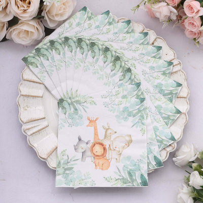 Animal-themed party napkins with floral design on a decorative plate.