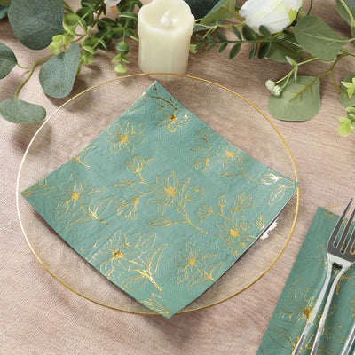 Decorative floral napkin on a plate, set on a textured table surface.
