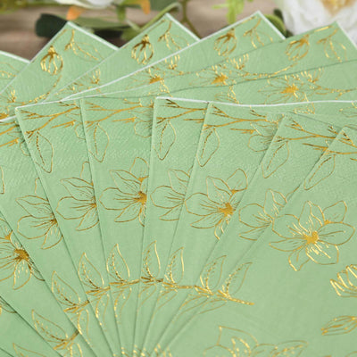 Green fan with gold floral design displayed in a fanned arrangement.