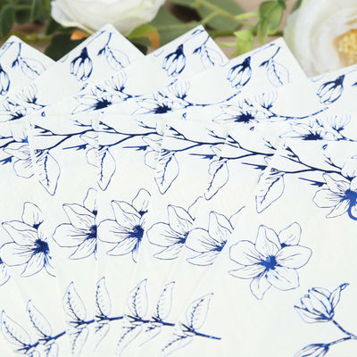 Navy floral patterned stationery with intricate flower designs.