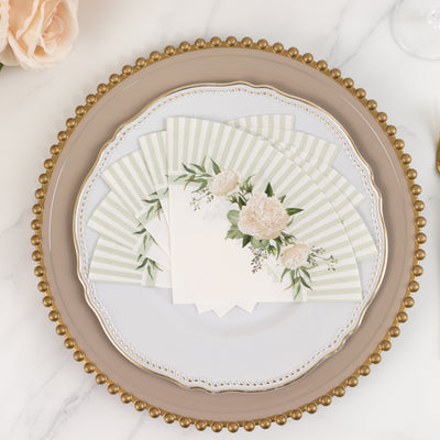 Floral stationery set on elegant plate with gold trim