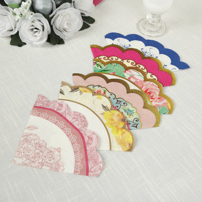 Colorful decorative paper napkins in various designs arranged on a table.