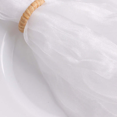 White sheer fabric tied with a natural fiber band