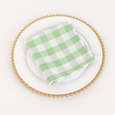 Green checkered napkin on a decorative plate