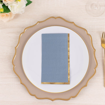 Elegant blue menu card on a decorative plate setting.