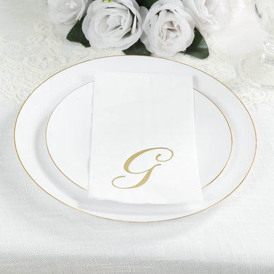 Elegant white plate with gold trim and personalized napkin featuring a gold letter "G".