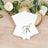 Elegant monogrammed notecards with a gold "K" design on a wooden surface.