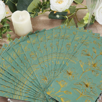 Floral patterned napkins arranged on a table with decorative elements.
