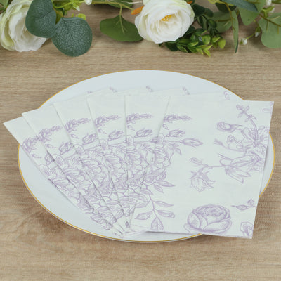 Floral patterned napkins arranged on a decorative plate.