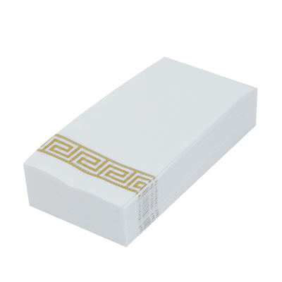 White paper napkins with gold Greek key design, stacked neatly.