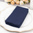 Navy blue cardstock stack on a decorative plate with flowers in the background.