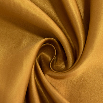 Golden satin fabric with smooth texture and sheen.