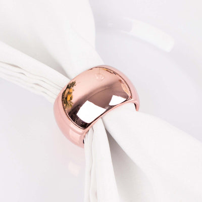 Rose gold napkin ring on a white table setting