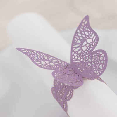 Purple lace butterfly napkin ring on a white napkin.