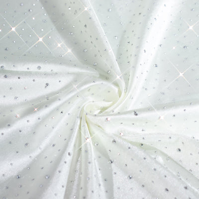 Sparkling white fabric with rhinestones and a shimmering finish. #whtbkgd