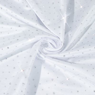 White fabric with sparkling rhinestones in a swirling pattern. #whtbkgd