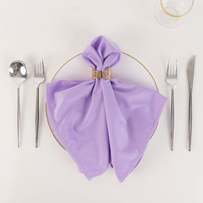 Lavender napkin elegantly arranged on a plate with silverware