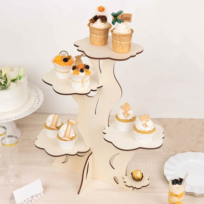 Decorative cupcake stand displaying assorted cupcakes and desserts.