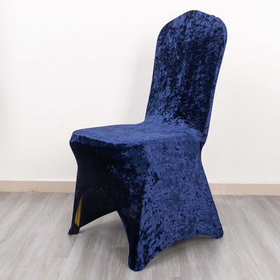 Navy blue velvet chair cover on a plain background