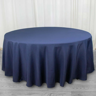 Navy round tablecloth on a plain background.