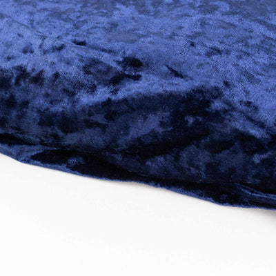 Navy blue plush fabric texture on a white background.