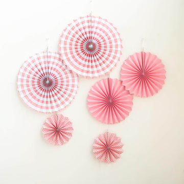 Add a Pop of Pink to Your Party with These Hanging Paper Fan Decorations
