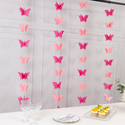 Colorful butterfly decorations hanging, perfect for parties and events.
