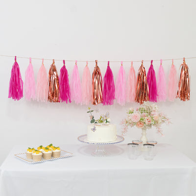 Pink and rose gold tassel garland decoration for parties and events.