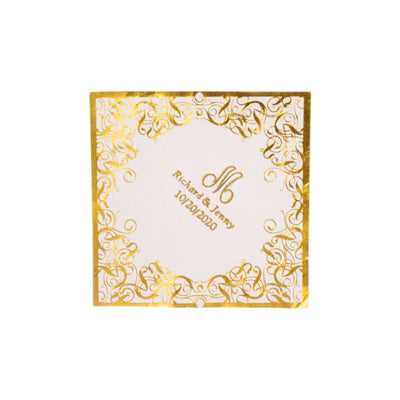 Elegant gold and white wedding invitation card with custom monogram.