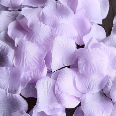 Lavender fabric flower petals close-up on dark wood background#whtbkgd