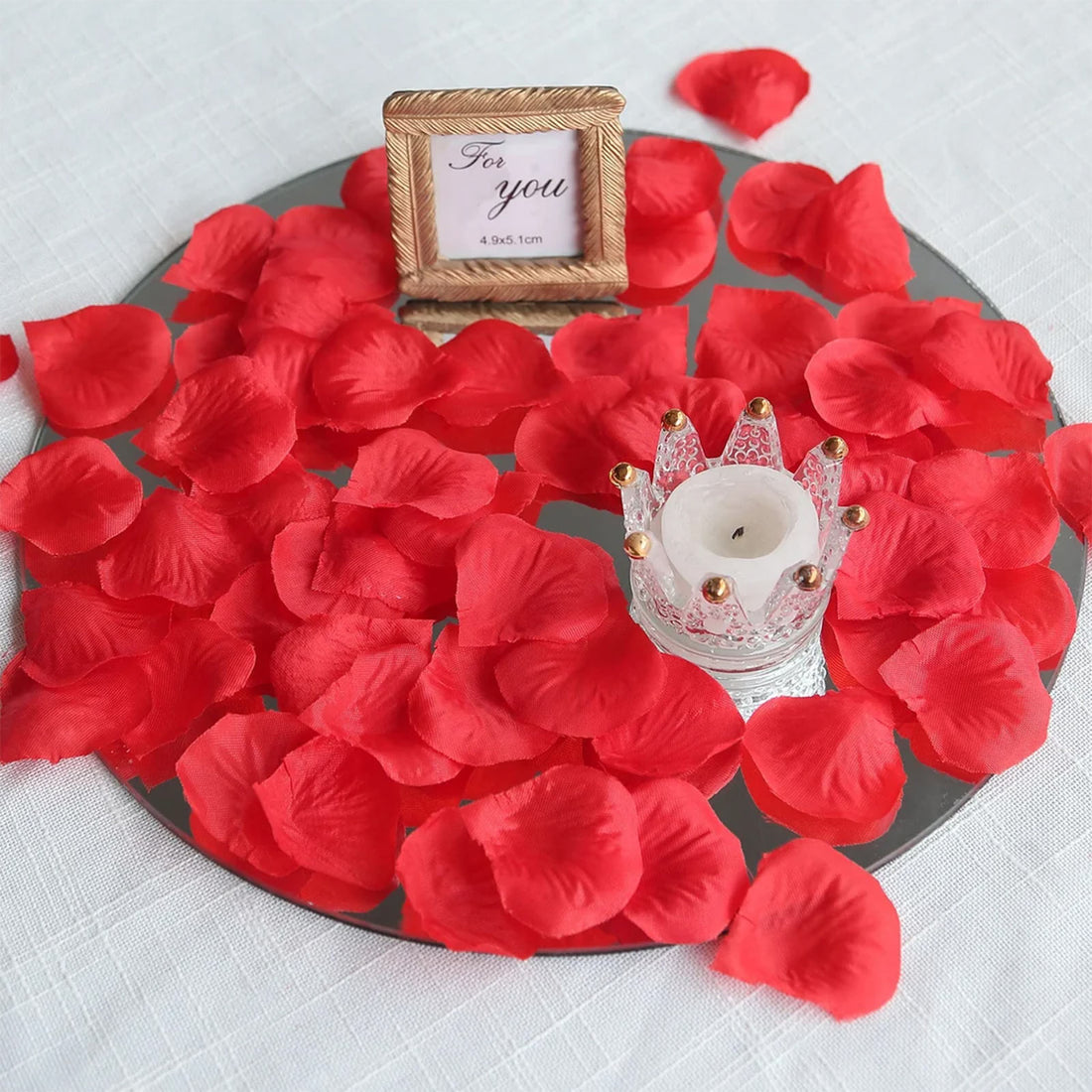 Romantic rose petal candle centerpiece with “For you” frame