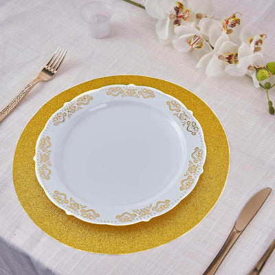 Elegant white plate with gold trim on a glittery gold charger