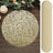 Gold glitter table runner on wooden surface, perfect for festive decor.