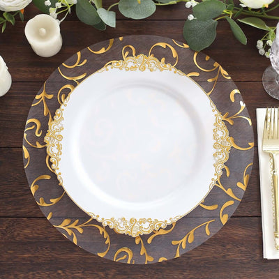 Elegant white plate with gold decorative rim on a wooden table.
