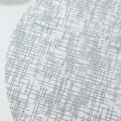 Silver glitter table runner with a textured pattern on a white background.