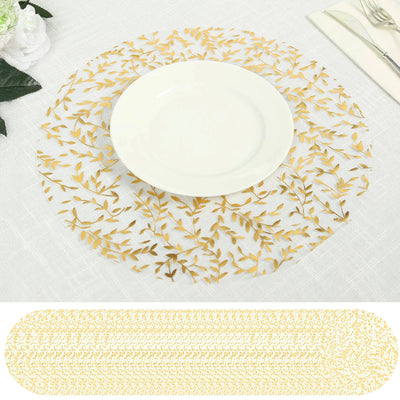 Gold leaf design round placemat with white plate on a textured tablecloth.