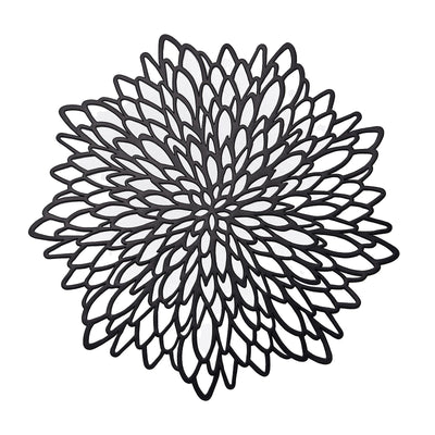 Black floral decorative mat on a white background.