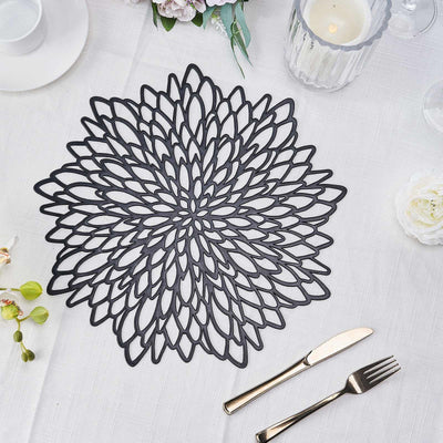 Black floral table placemat on a light table setting