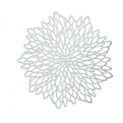 White decorative floral lace doily on a plain background