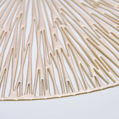 Gold textured table runner with abstract design.
