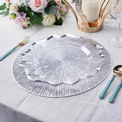 Elegant decorative plate with a textured design on a dining table setting.