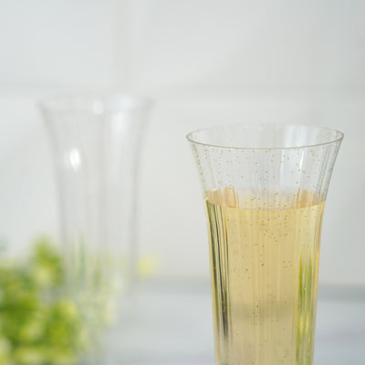Champagne in elegant fluted glass with sparkling bubbles