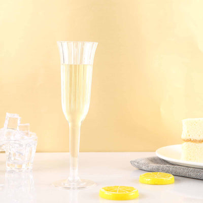 Champagne glass with lemon slices on a table