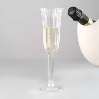 Elegant champagne flute with sparkling wine, showcasing a classic design.