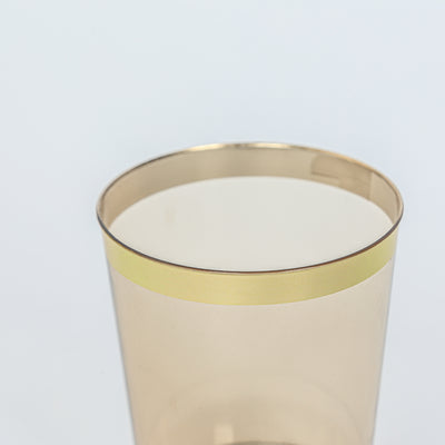 Transparent glass with gold rim detail