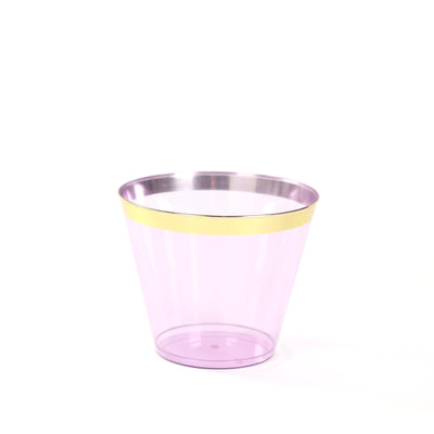 Purple plastic cup with a gold rim, studio shot.