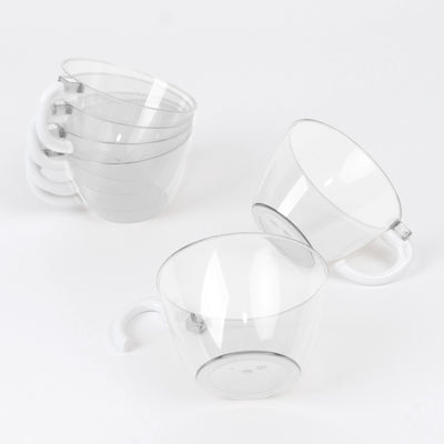 Stacked clear measuring cups on a white background.
